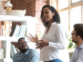 a woman presenting in a meeting