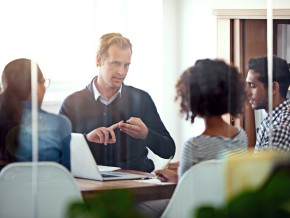 man giving advice in a meeting