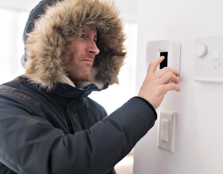 Image of man flicking a switch