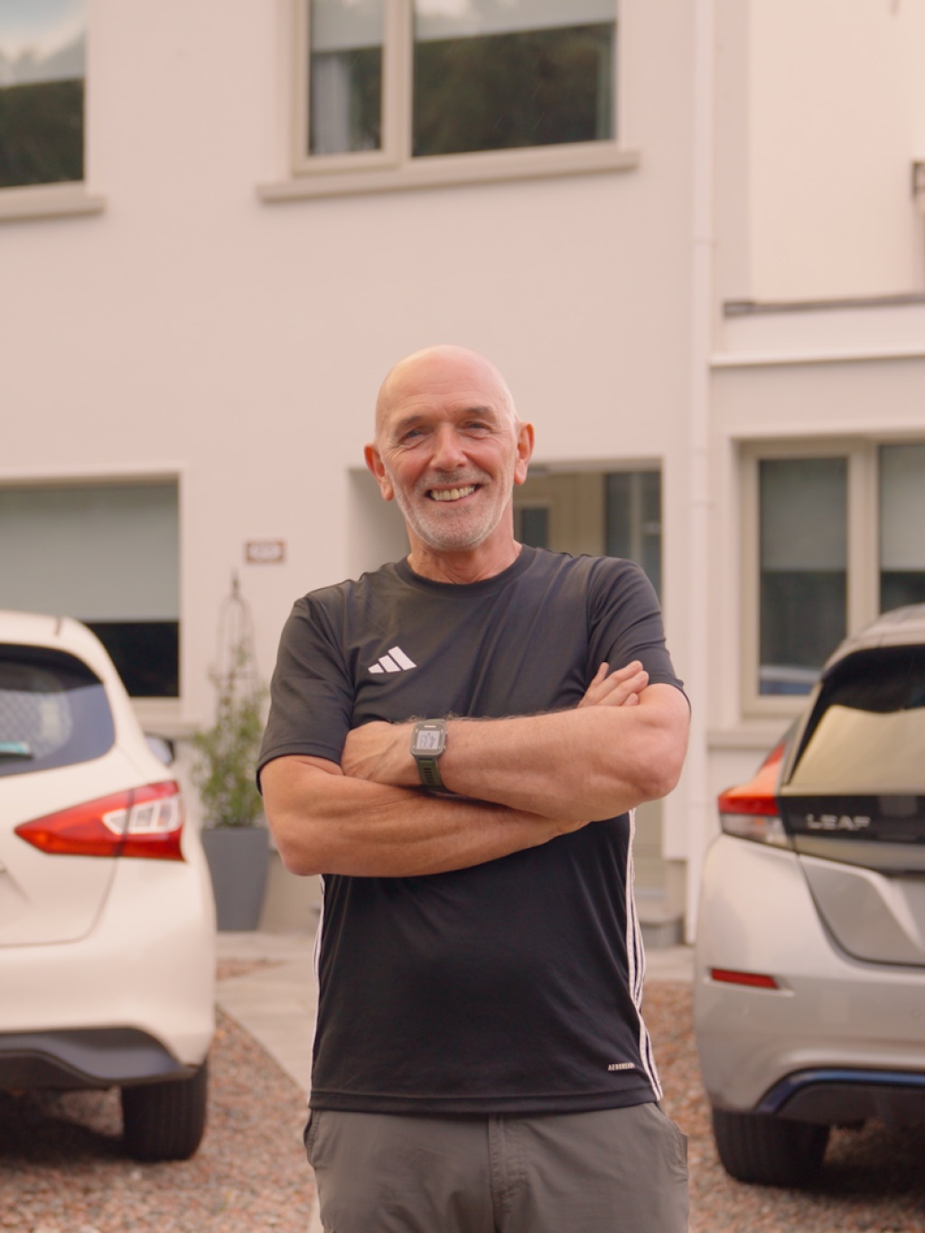 John Brady, a homeowner, standing outside his recently upgraded home.