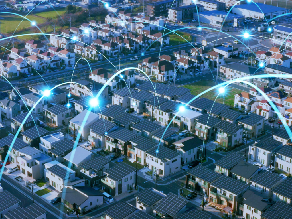 Houses in a neighbourhood with roof solar panels connected by electricity surges