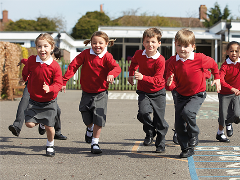 Children playing is a school playground